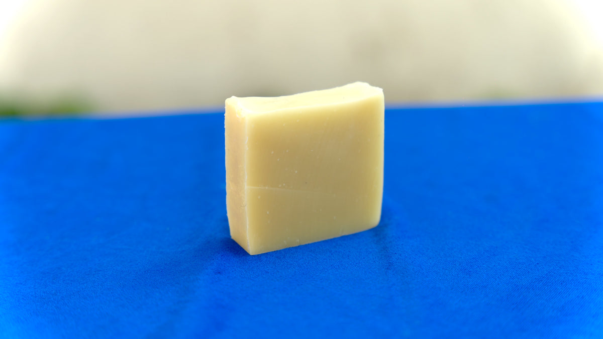 Dousman Soap Bar On Blue Cloth Standing